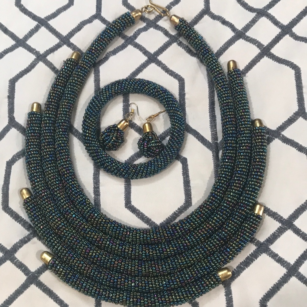 Multi colored necklace, bracelet and earrings set